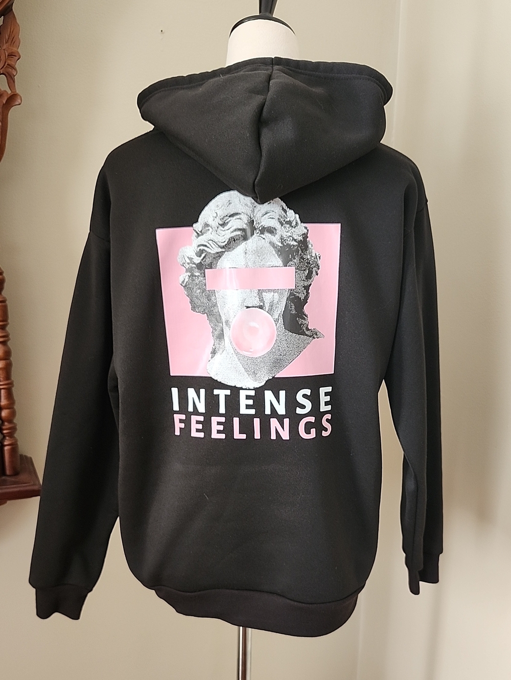 Intense Feelings Black Hoodie with Pink Graphic